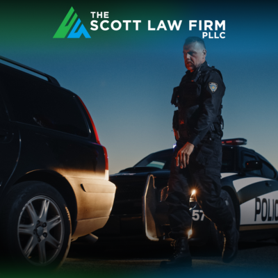 A police officer approaching the car of a person suspected of drunk driving in Vancouver